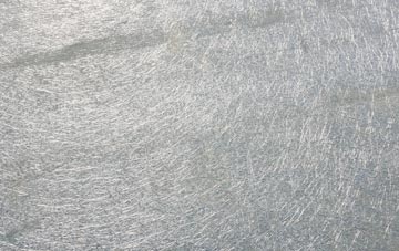 Polmaily laminate fibreglass or shingles?